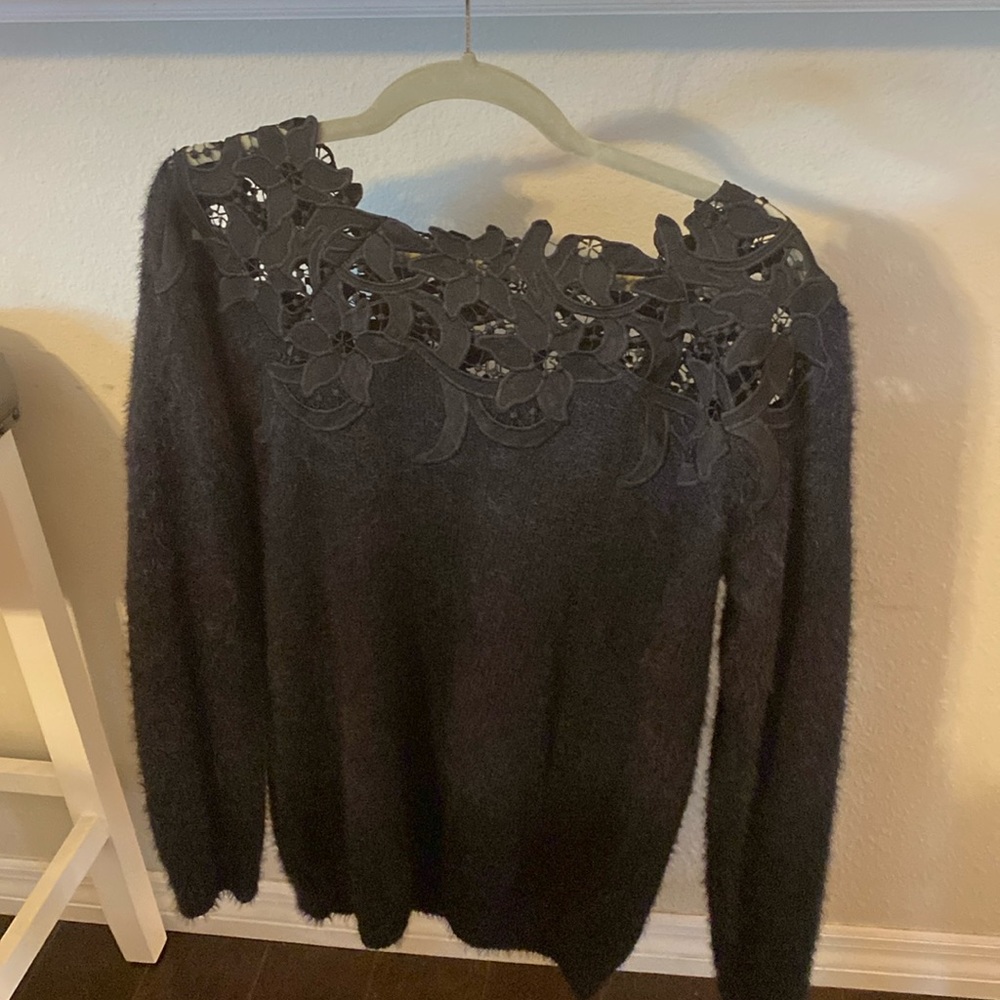 Vici black sweater with floral decals. Never worn/ with tags